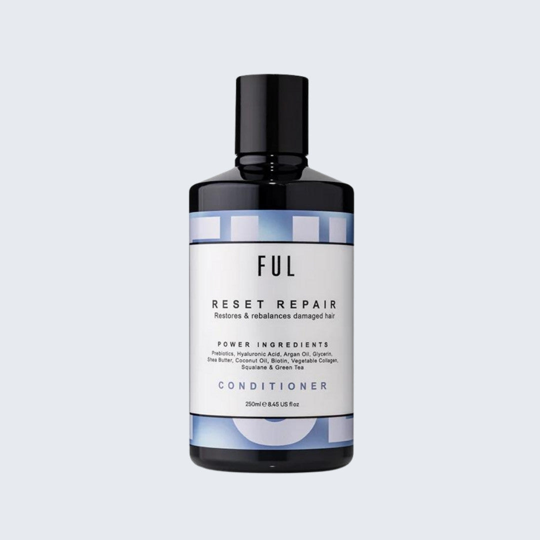 Bottle of FUL Reset Repair conditioner on a light gray background