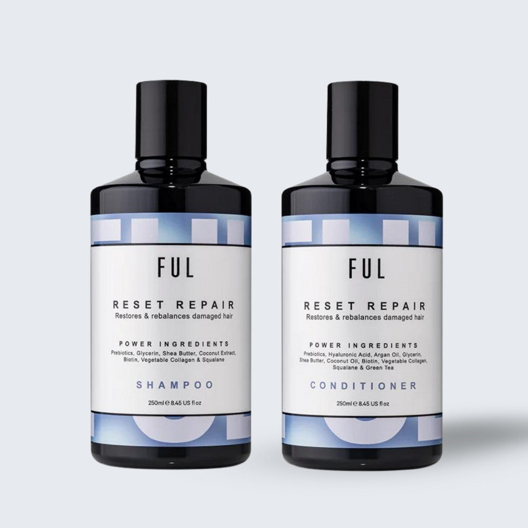 Two bottles of FUL Reset Repair Shampoo and Conditioner on a light gray background