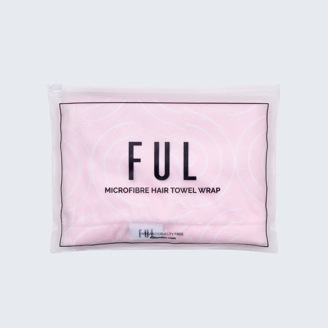 Pink microfibre hair towel wrap with 'FUL' branding on a grey background