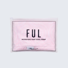 Pink microfibre hair towel wrap with 'FUL' branding on a grey background