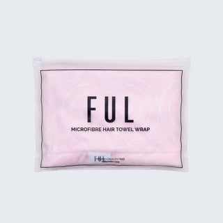 Pink microfibre hair towel wrap with 'FUL' branding on a grey background