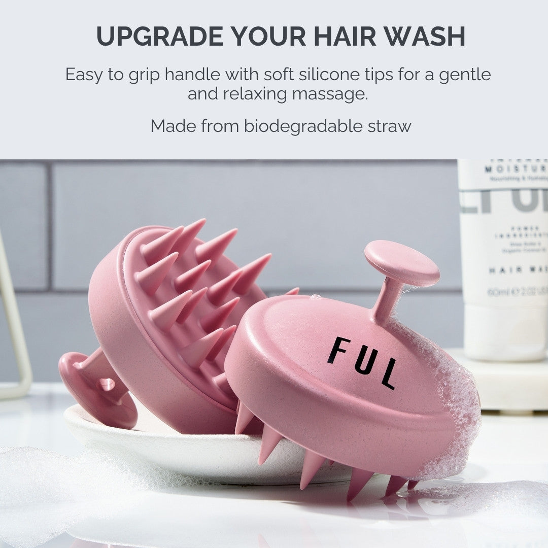 Pink hair scrubber with soft silicone tips on a white surface, text about hair wash and product features.