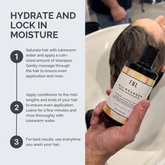 Person holding a bottle of FUL shampoo with hair care instructions on the side.