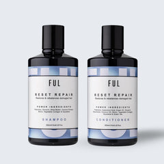 Two bottles of FUL Reset Repair Shampoo and Conditioner on a light gray background