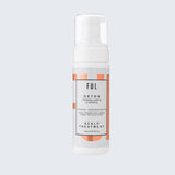 Foam scalp treatment bottle labeled 'FUL' on a light gray background